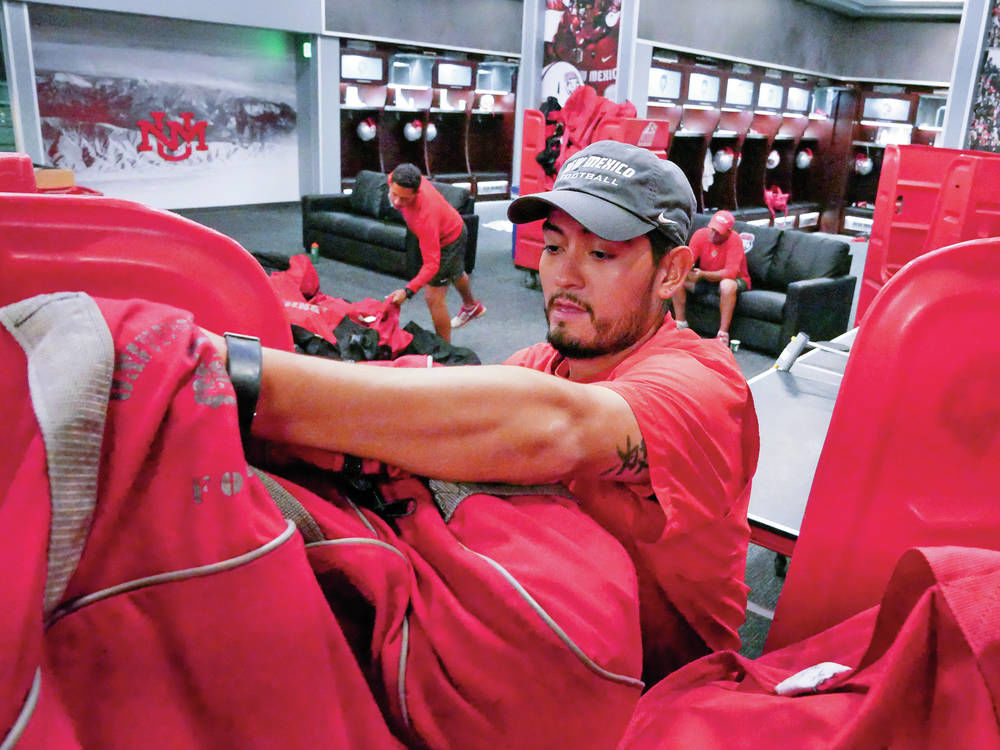Small army of movers gets Lobos’ gear on road